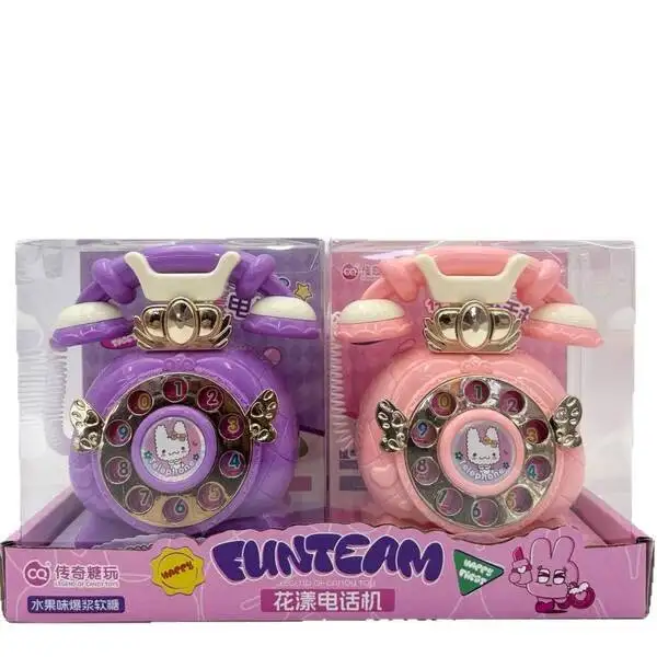 Vintage Princess Style Toy Telephone with Light & Candy Cute pink vintage style toy telephone with rabbit illustration and light features.