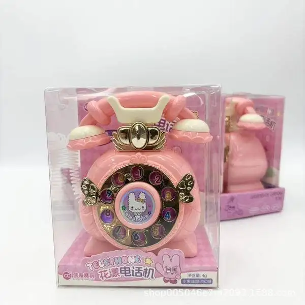 Cute pink vintage style toy telephone with rabbit illustration and light features.