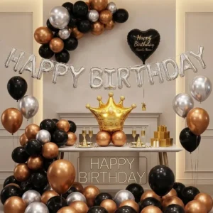 Black and gold happy birthday balloon kit with silver banner and golden crown foil balloon.