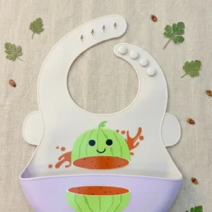 Light gray and pastel lavender waterproof silicone baby bib featuring a cute smiling watermelon print and adjustable neck buttons.