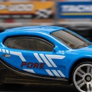 Packaged die-cast metal toy vehicle set showing a yellow helicopter, sports cars, and a motorcycle in red blister display boxes.