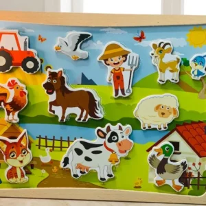 Double-sided wooden magnetic toy board showing a colorful farm scene with animal magnets on one side and a dry-erase whiteboard with a marker on the reverse.