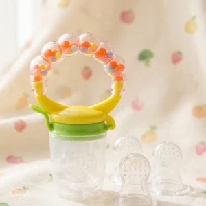 Baby fruit feeder pacifier with a colorful bead rattle handle and extra replacement silicone teats.