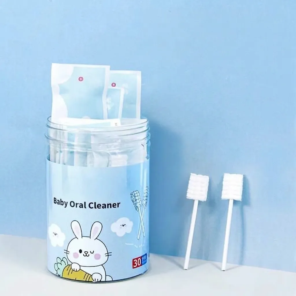 Container of disposable baby oral cleaner gauze swabs for newborn tongue and gum cleaning.